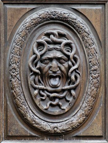 Gorgoneion (Gorgon mask) by Thomas Regnaudin (French, 1622–1706). Carved wood, ca. 1660, from the door panels of the Hôtel Amelot de Bisseuil, 47 rue Vieille-du-Temple, 4th arrondissement of Paris (image public domain)